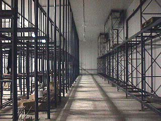Rack-supported refrigerated warehouse